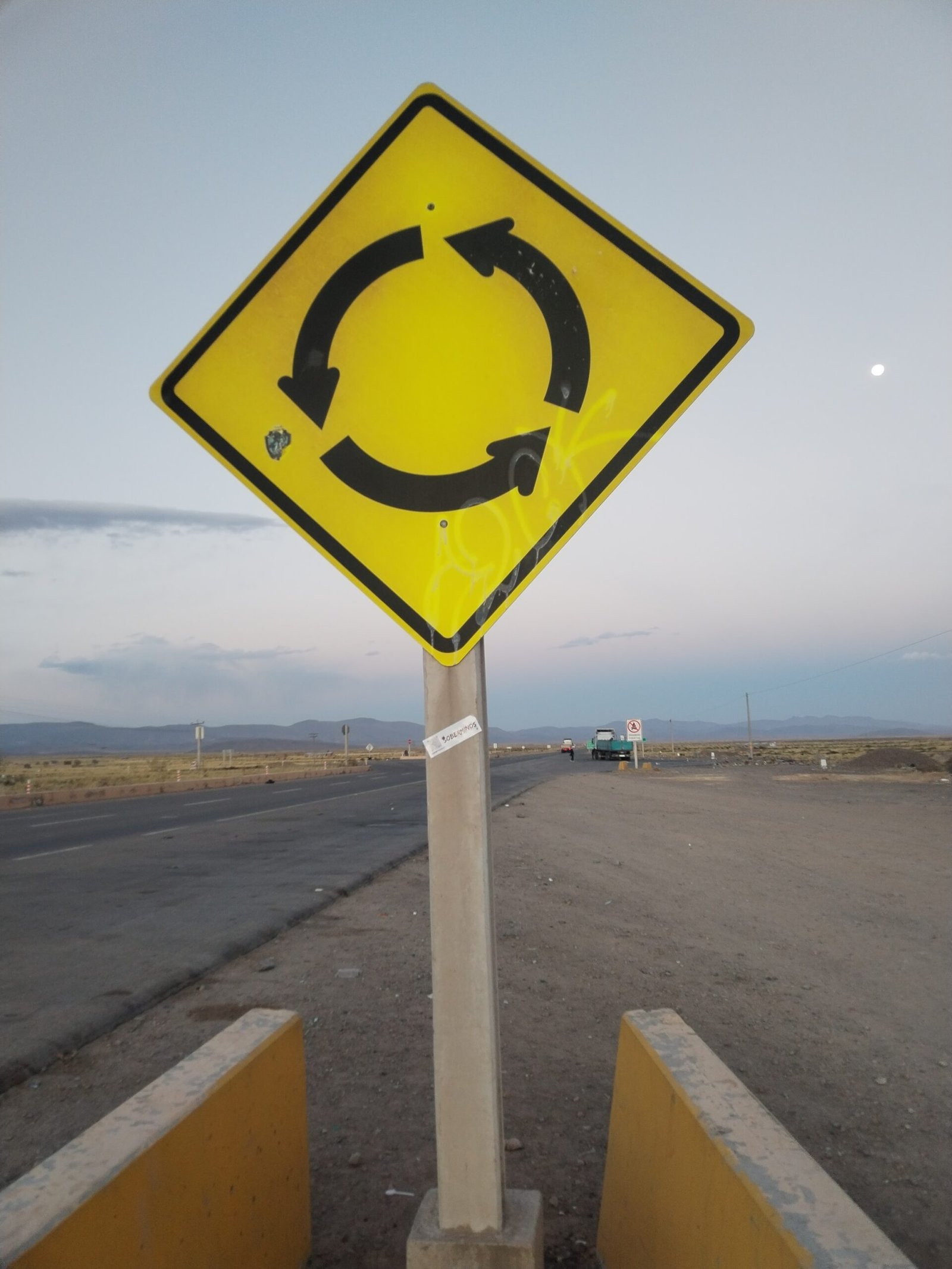 A roundabout traffic sign.