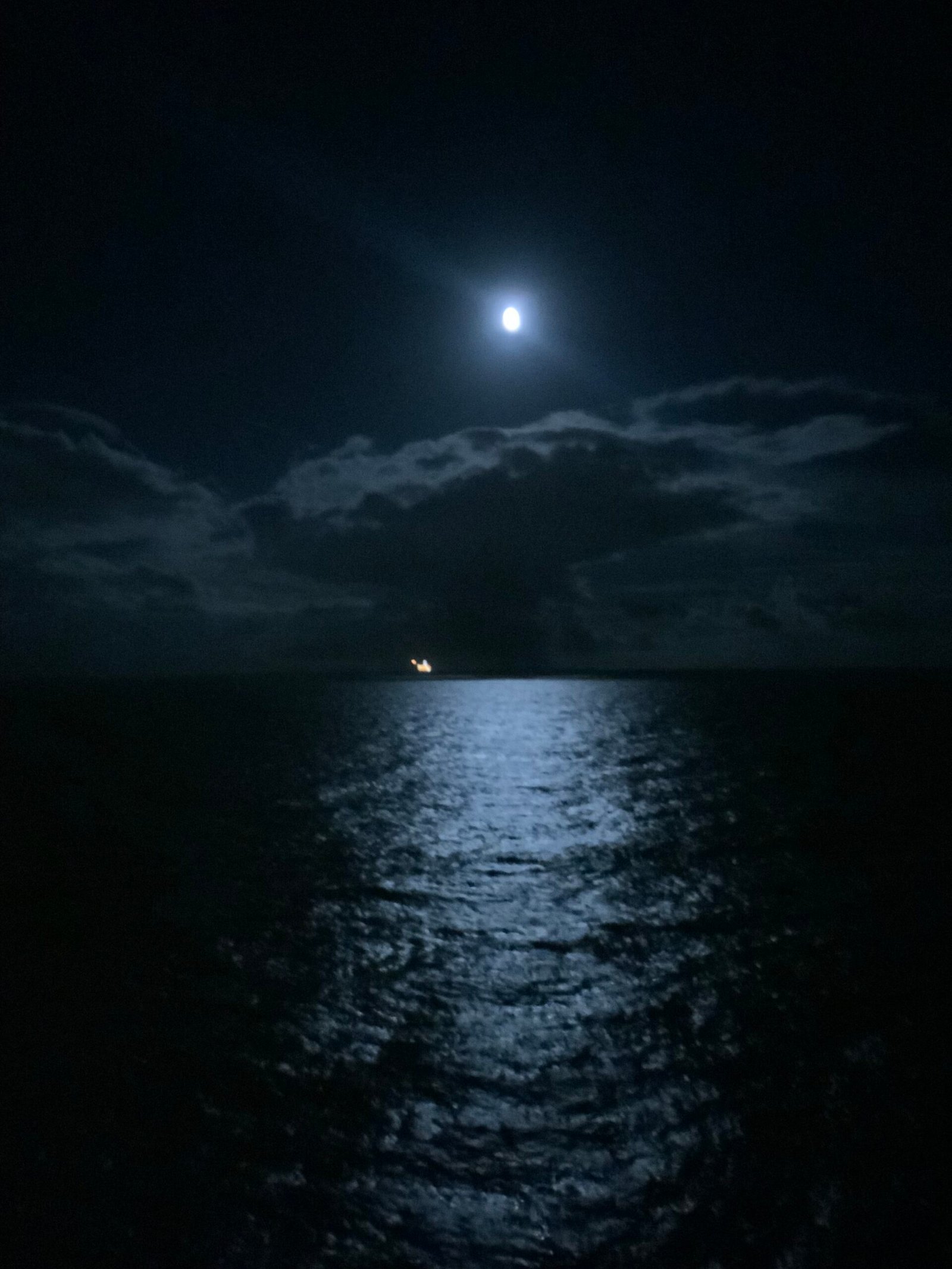 Moonlight reflecting across calm ocean water, representing stillness and peace in recovery.